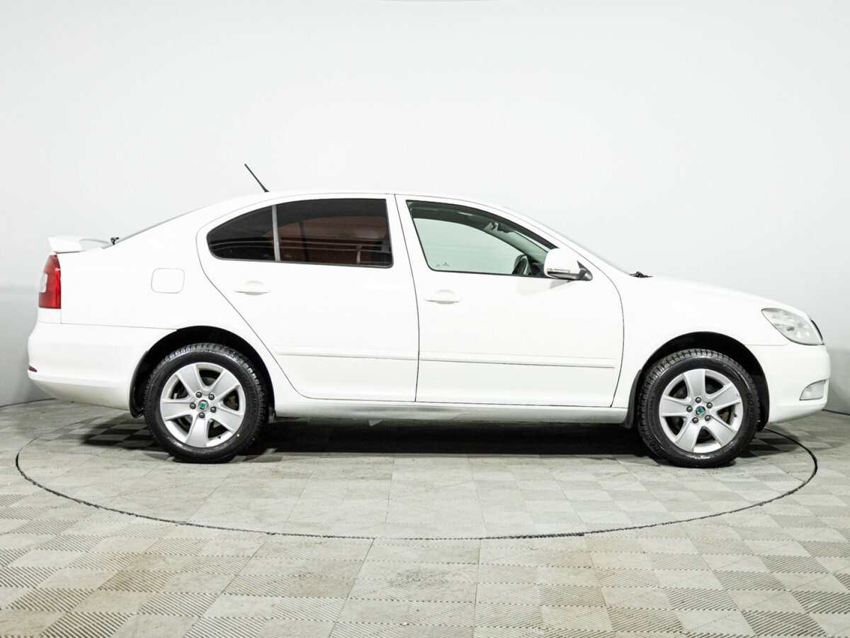 Skoda Octavia 2012 года с пробегом. Фото: #3