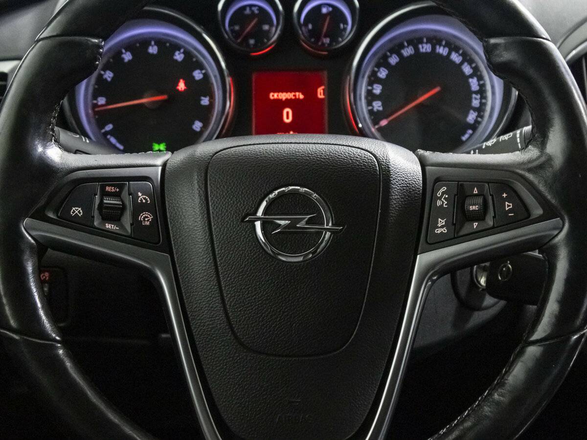 Б/У Опель Астра 2013 года. Фото: #11