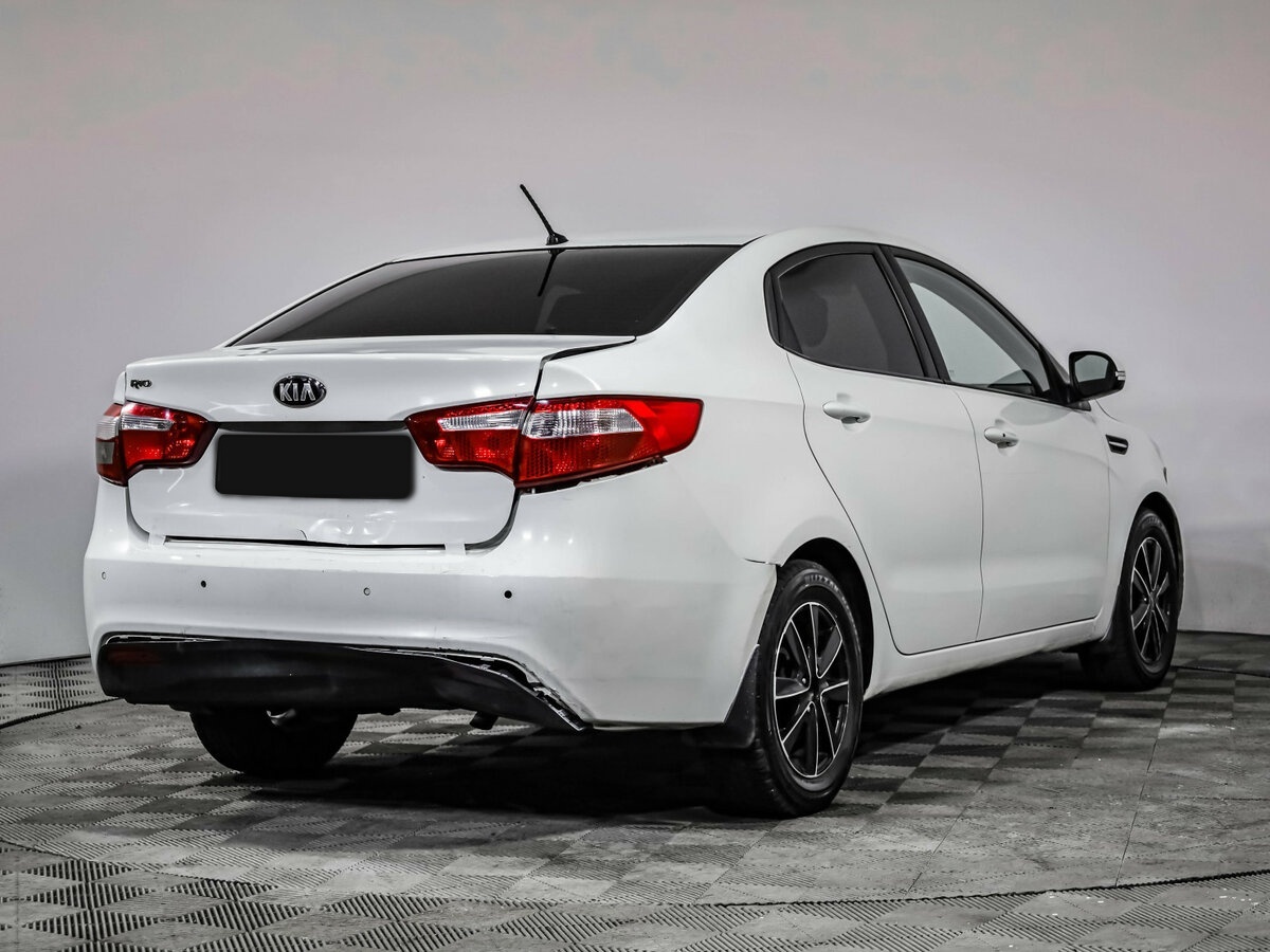 Kia Rio 2013 года с пробегом. Фото: #3